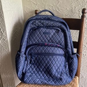 Denim blue Vera Bradley Backpack with floral inner lining